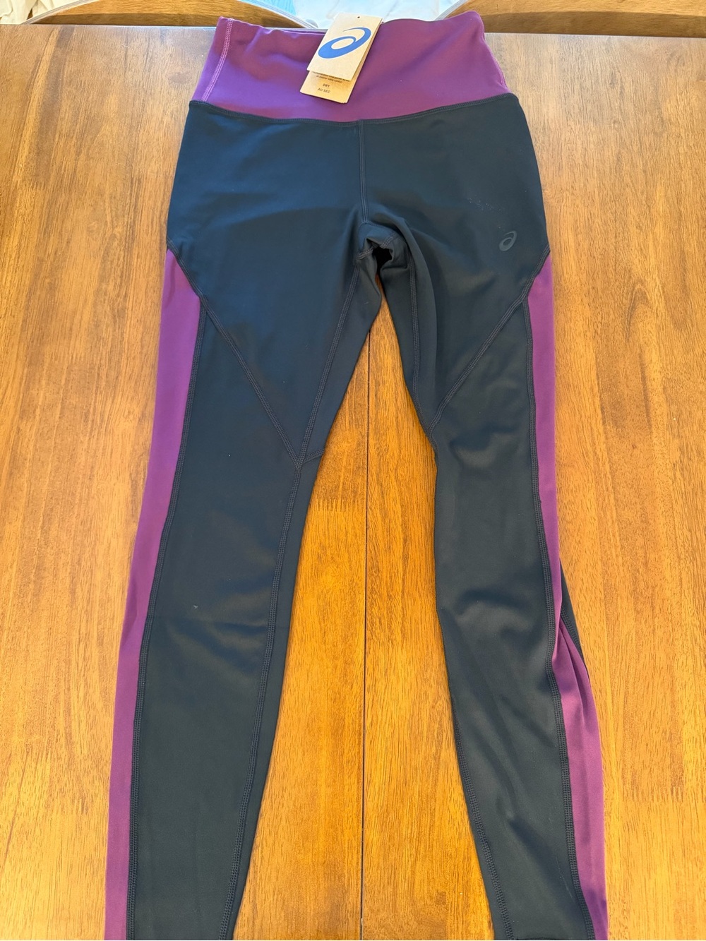Asics Black Athletic Apparel with Blue Logo